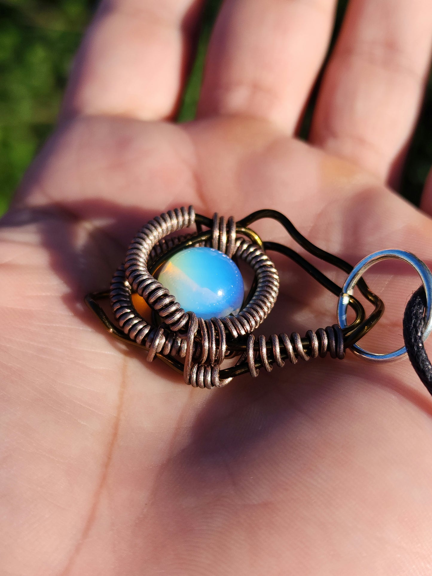 Eye of a Serpent. Opalite necklace. Made by Eyesthatburnthemind.