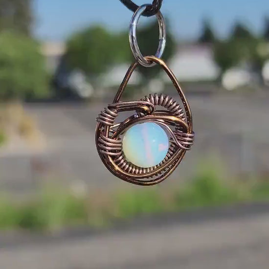 Eye of A Serpent. Opalite necklace. Made by Eyesthatburnthemind
