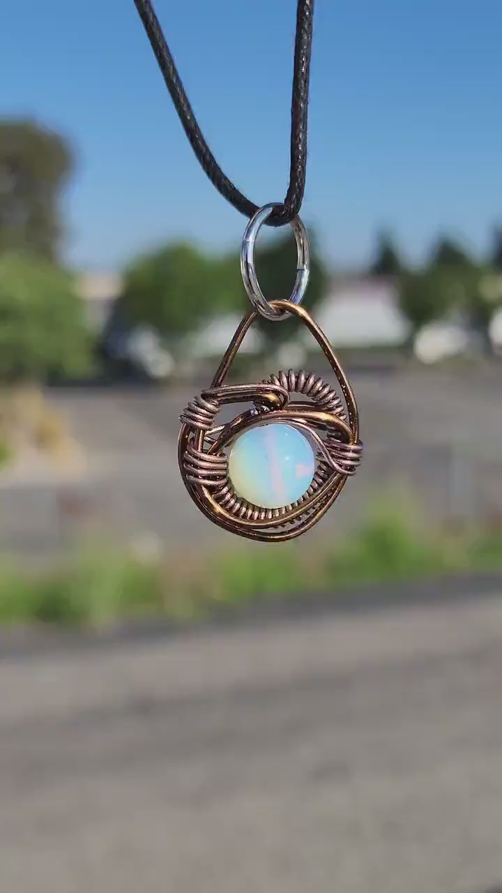 Eye of A Serpent. Opalite necklace. Made by Eyesthatburnthemind