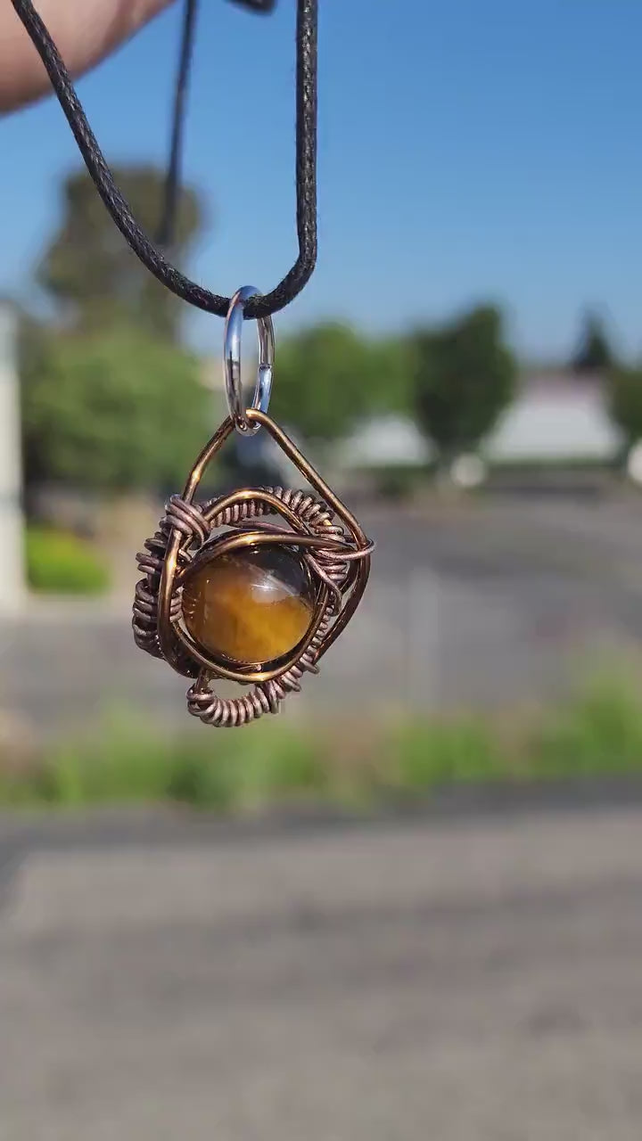 Primordial Vision. Golden Tigers Eye necklace. Made by Eyesthatburnthemind.