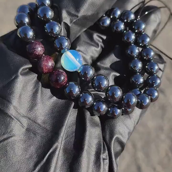 Mo·ral·i·ty. Pair of Hematite/ Opalite and Garnet bracelets. Your choice of size. Made by Eyesthatburnthemind.