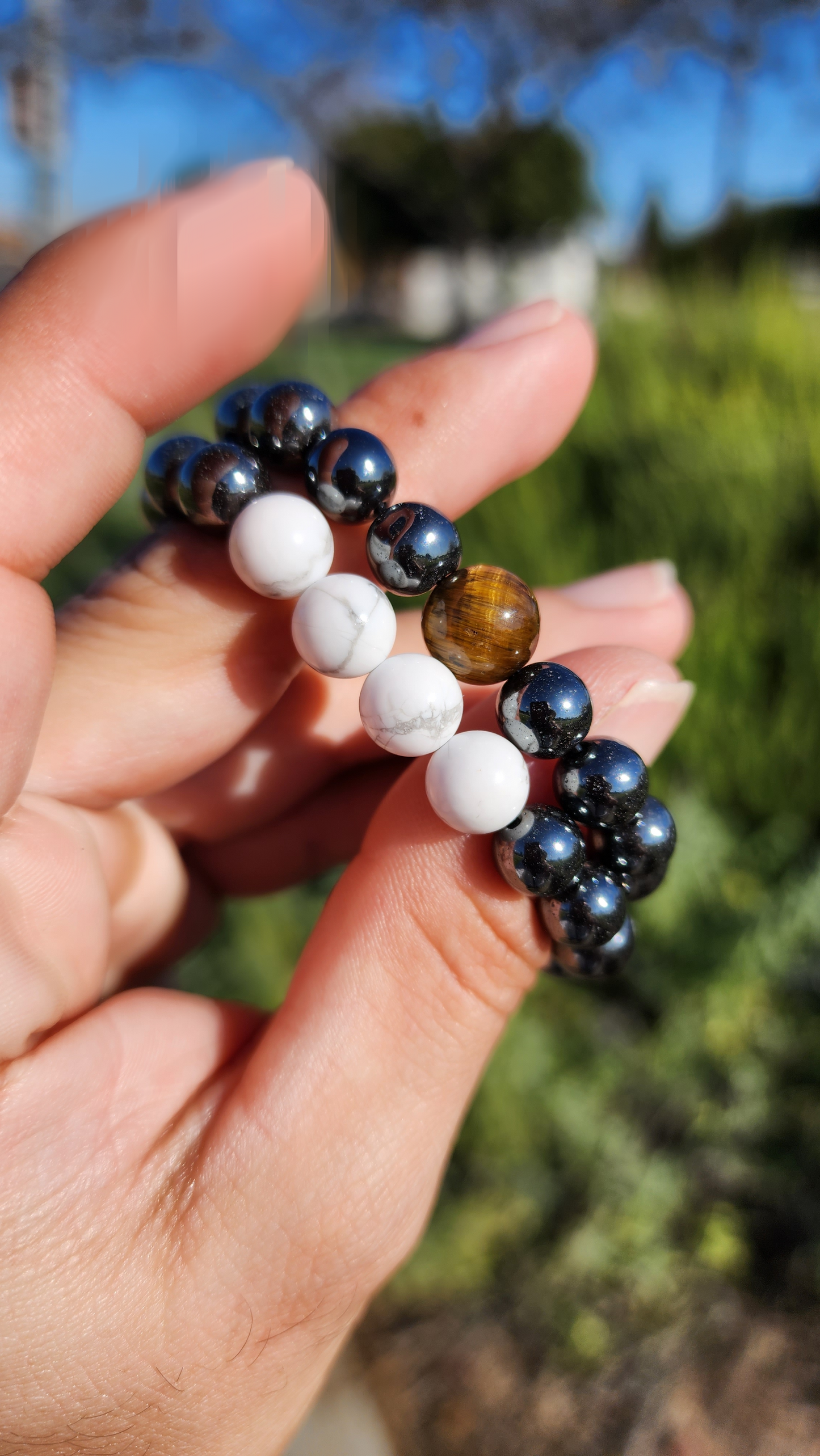 Powerstanced And Balanced. Pair of Hematite, Howlite and Tigers Eye Natural Bracelets. Made by Eyesthatburnthemind.