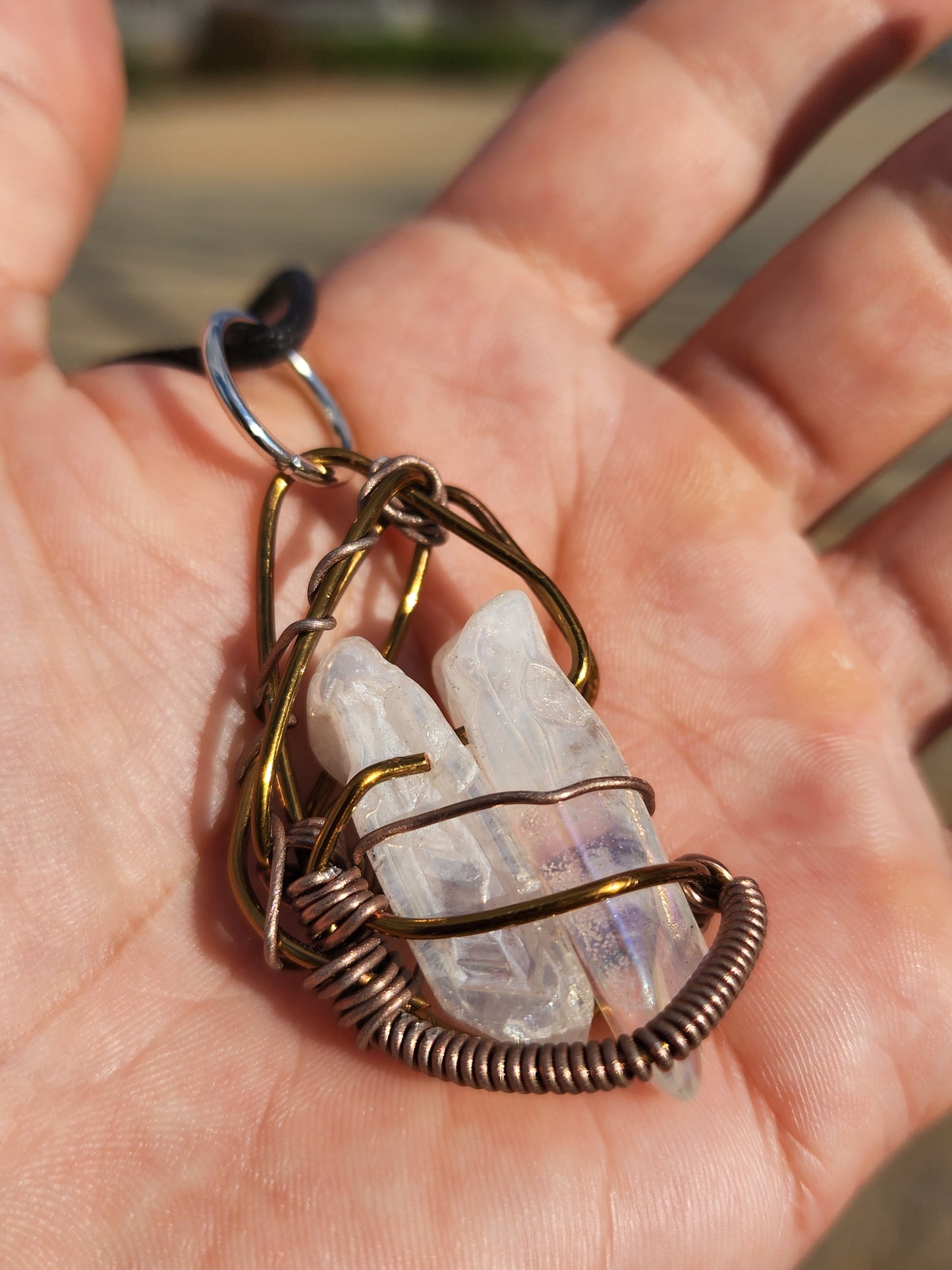 Trapped Companion. Flashed Quartz crystal necklace. Made by Eyesthatburnthemind.