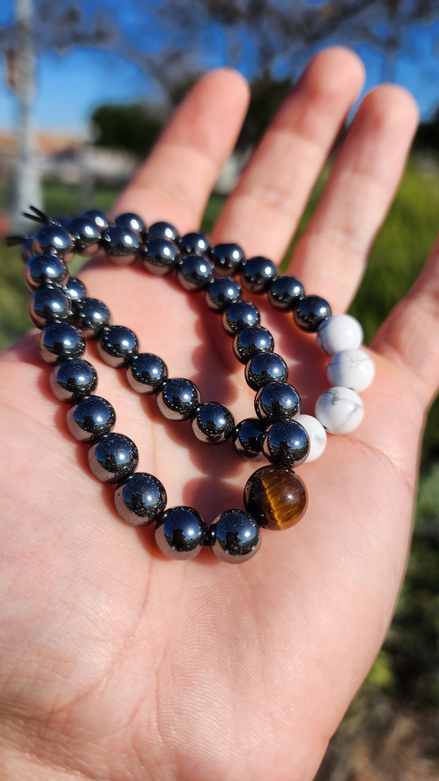 Powerstanced And Balanced. Pair of Hematite, Howlite and Tigers Eye Natural Bracelets. Made by Eyesthatburnthemind.