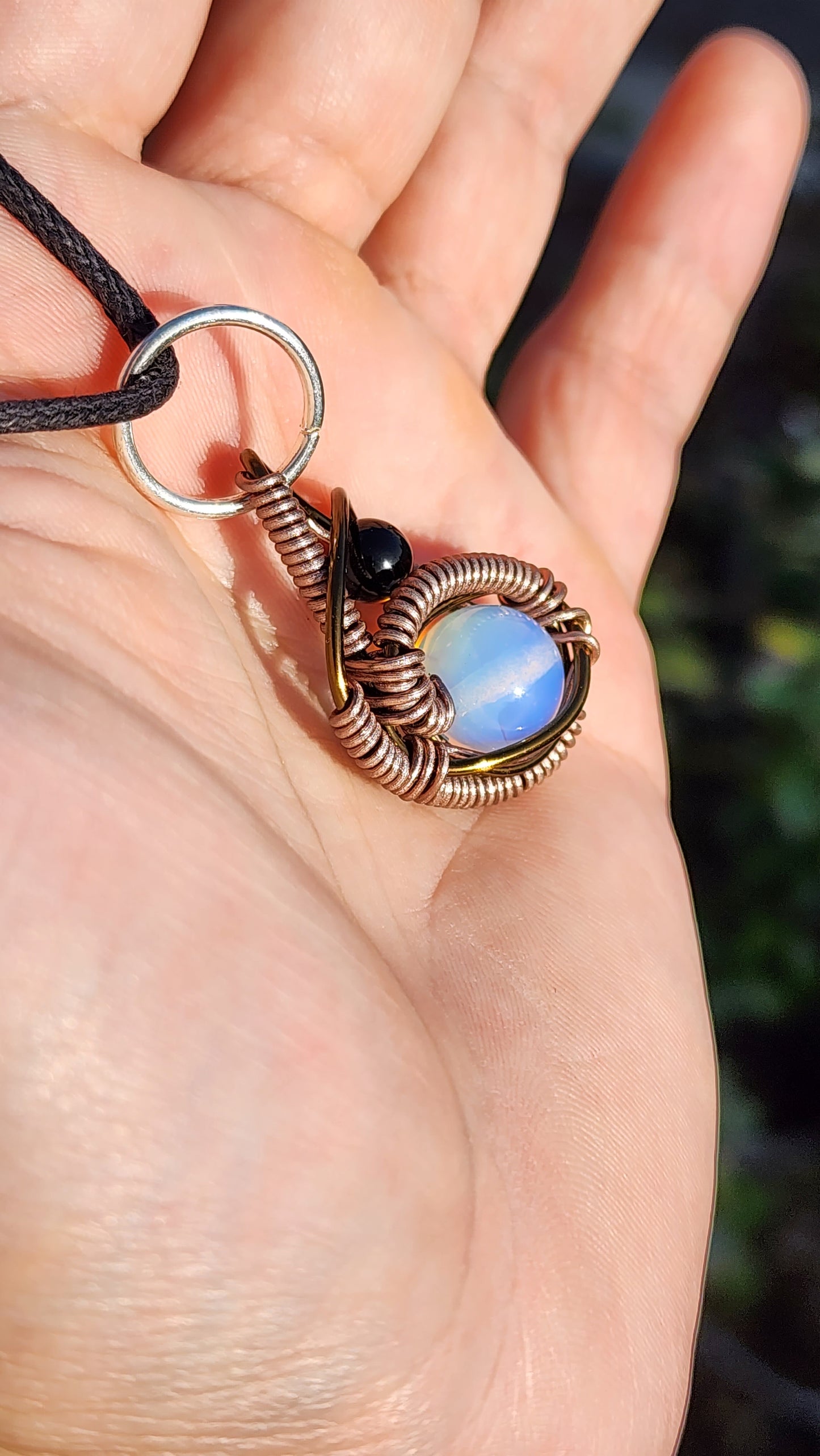 Soul Of A Serpent. Opalite and Obsidian necklace. Made by Eyesthatburnthemind.