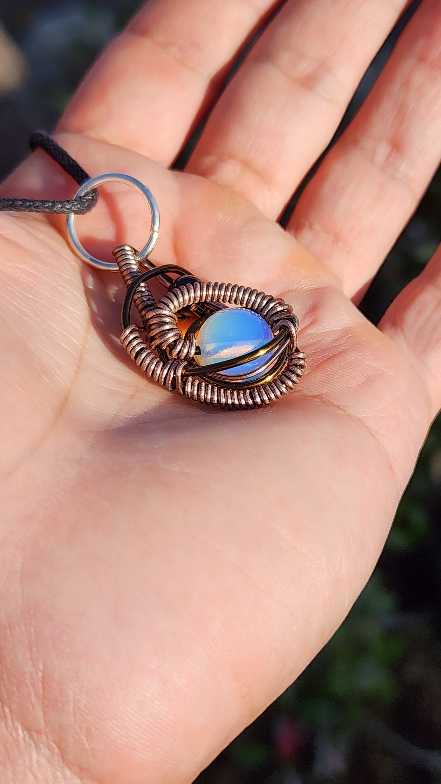 Soul Of A Serpent. Opalite and Obsidian necklace. Made by Eyesthatburnthemind.