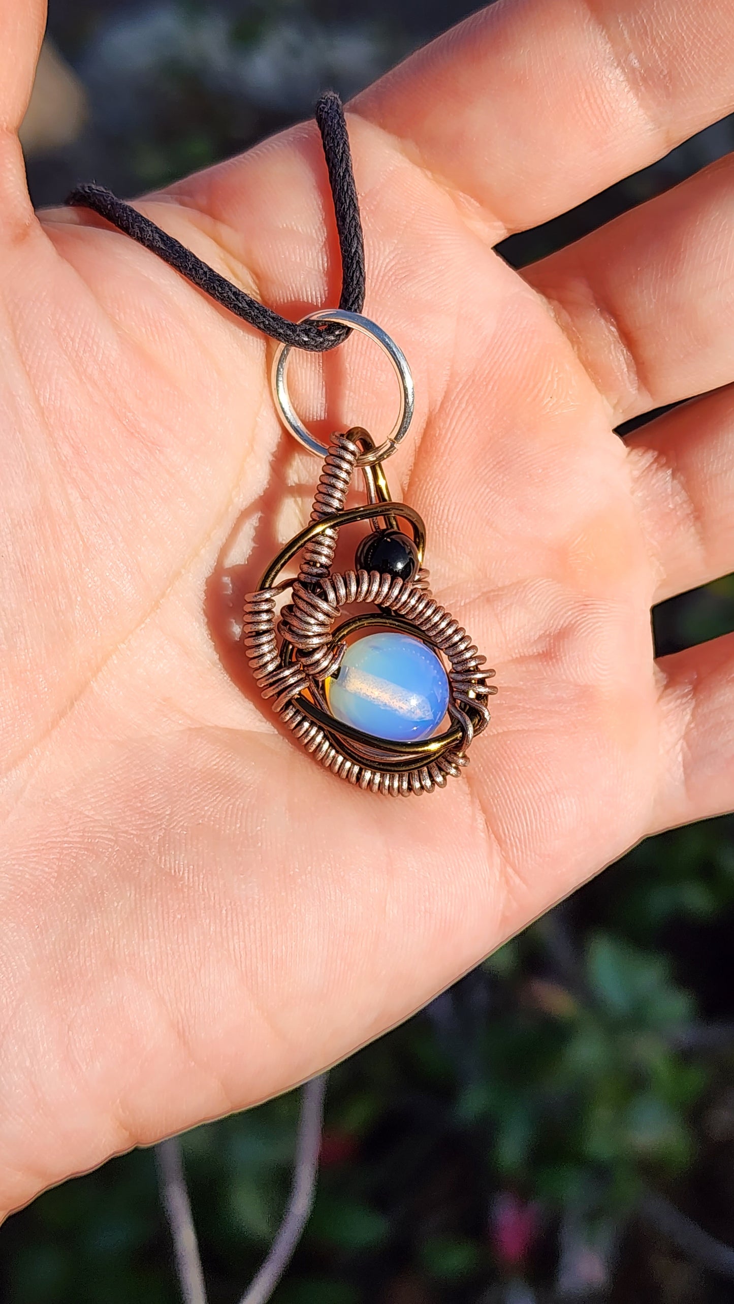 Soul Of A Serpent. Opalite and Obsidian necklace. Made by Eyesthatburnthemind.