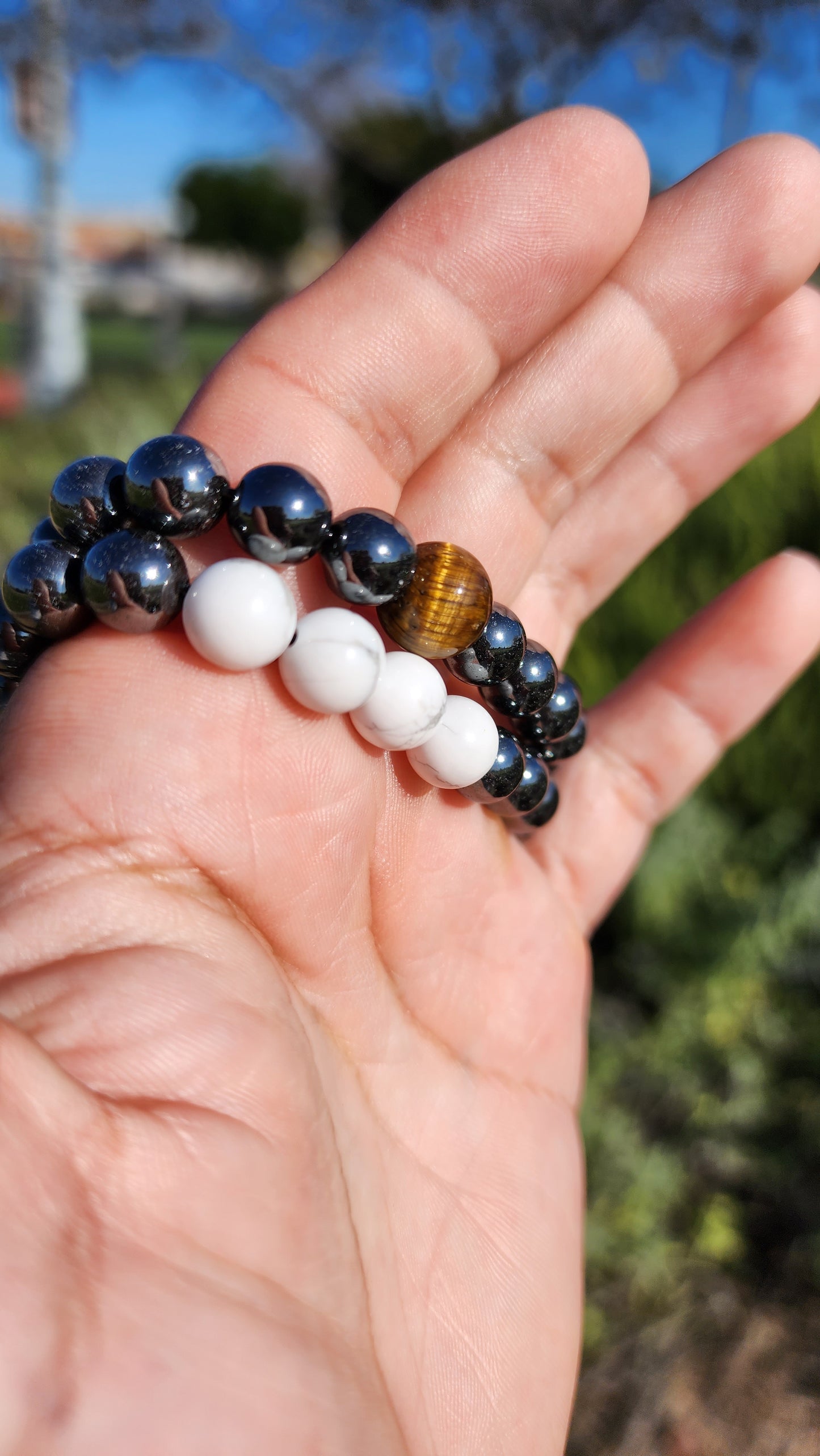 Powerstanced And Balanced. Pair of Hematite, Howlite and Tigers Eye Natural Bracelets. Made by Eyesthatburnthemind.