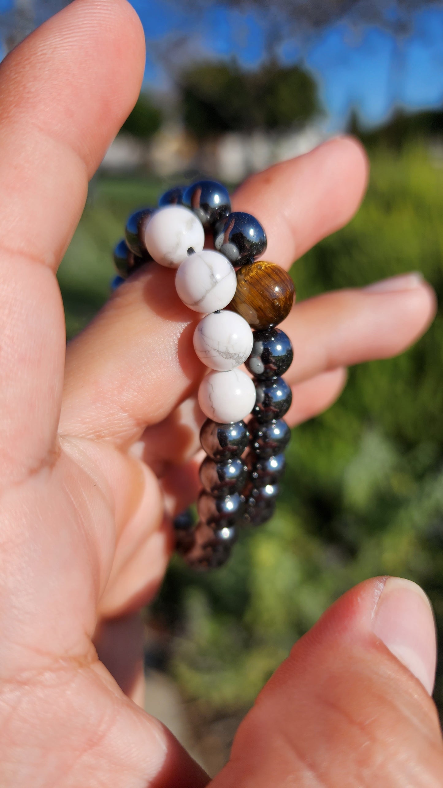 Powerstanced And Balanced. Pair of Hematite, Howlite and Tigers Eye Natural Bracelets. Made by Eyesthatburnthemind.