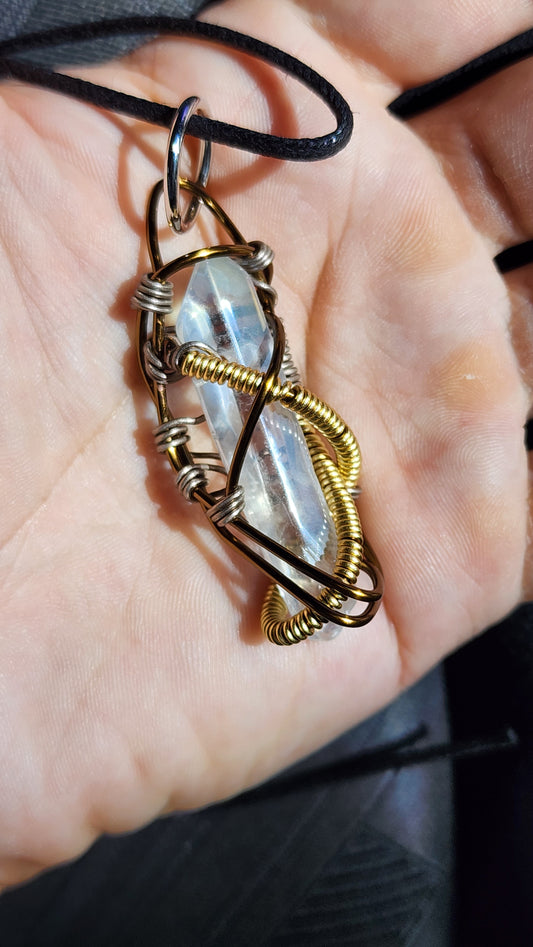 Aura Reflection. Flashed quartz crystal necklace. Made by Eyesthatburnthemind.