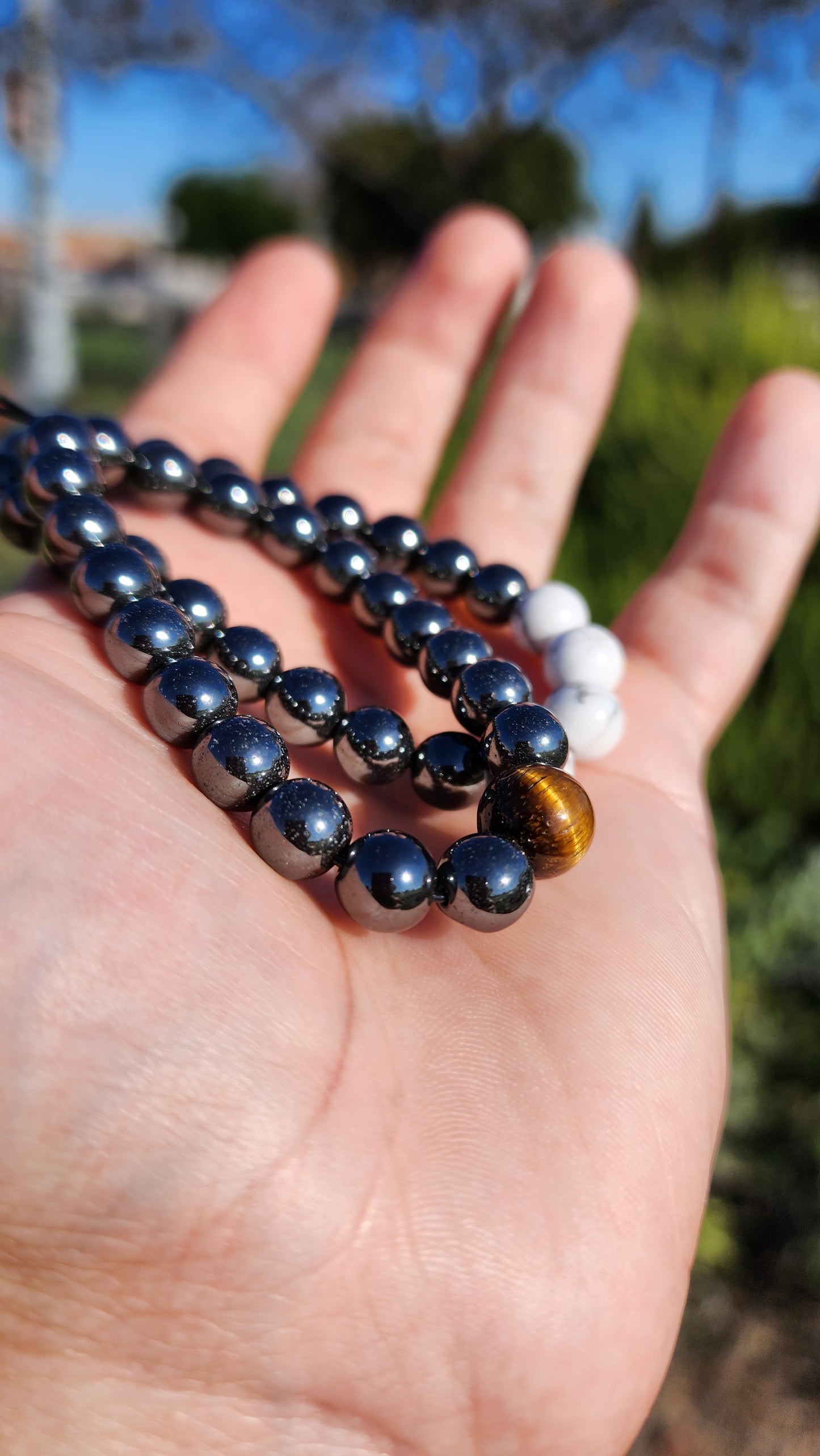 Powerstanced And Balanced. Pair of Hematite, Howlite and Tigers Eye Natural Bracelets. Made by Eyesthatburnthemind.