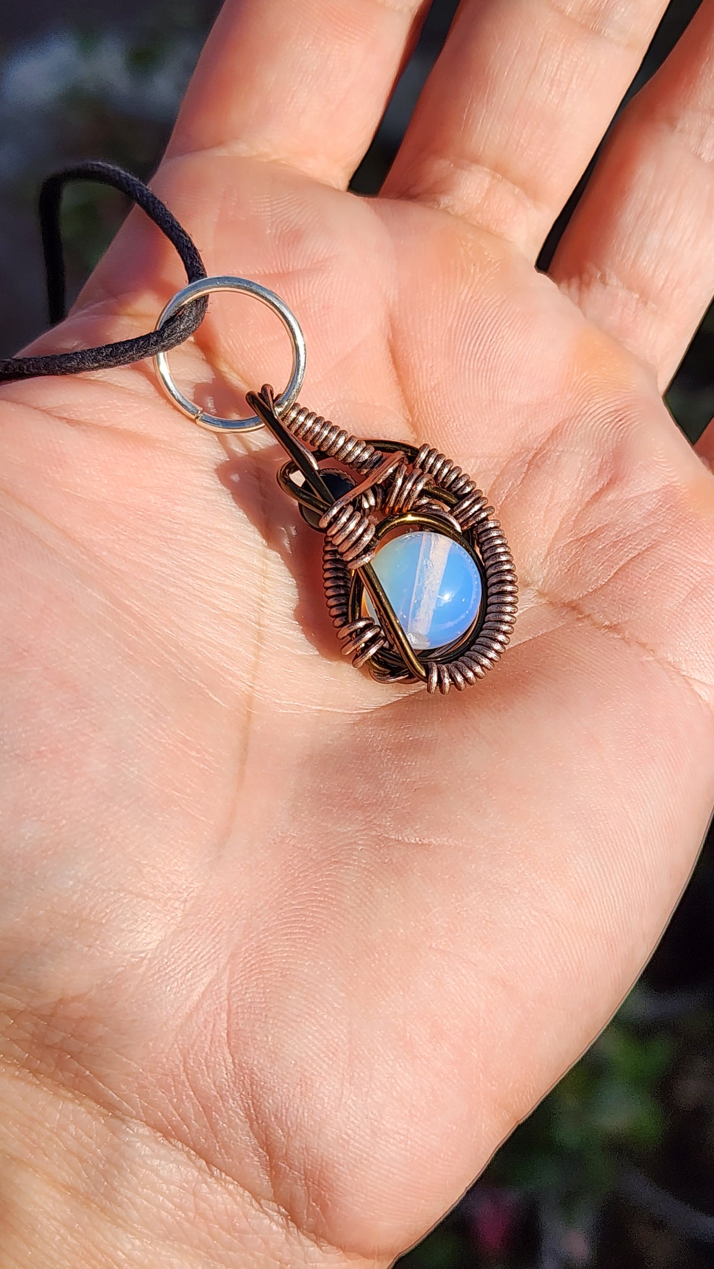 Soul Of A Serpent. Opalite and Obsidian necklace. Made by Eyesthatburnthemind.