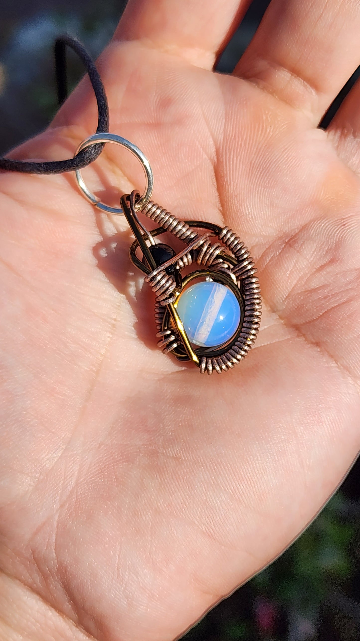 Soul Of A Serpent. Opalite and Obsidian necklace. Made by Eyesthatburnthemind.