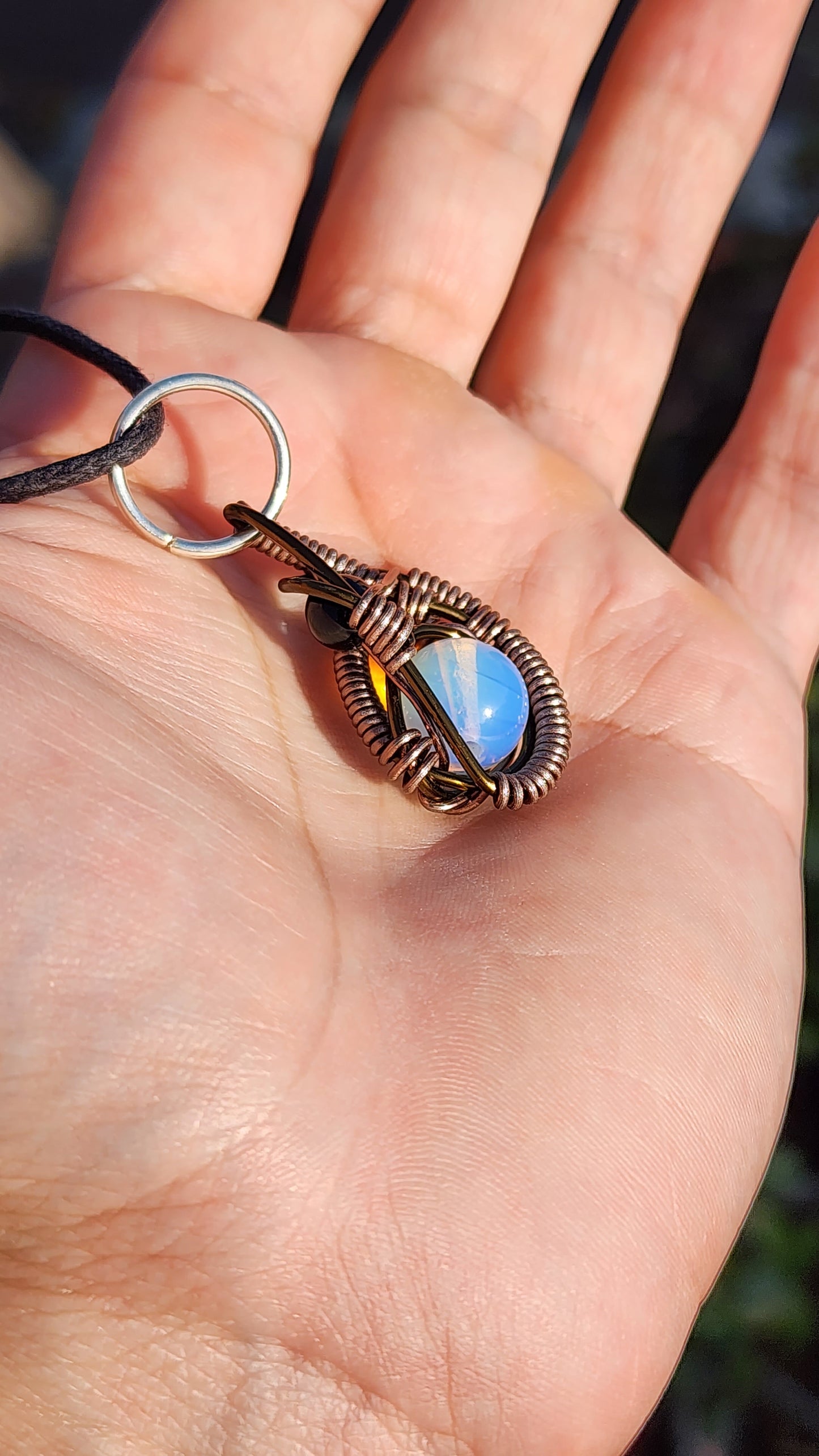 Soul Of A Serpent. Opalite and Obsidian necklace. Made by Eyesthatburnthemind.