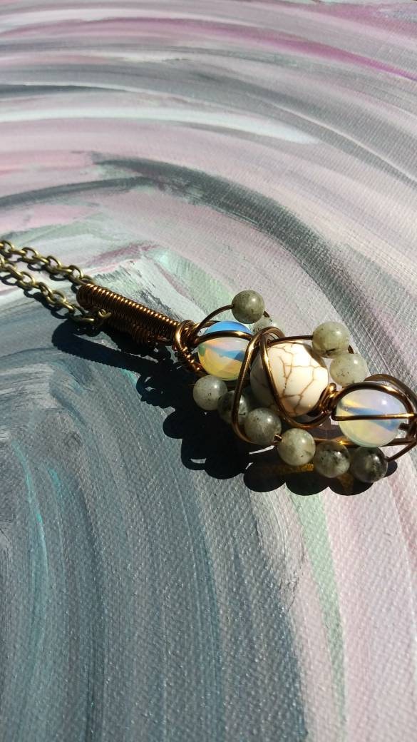 Mad Images. Opalite, howlite and labradorite necklace. Made by Eyesthatburnthemind.