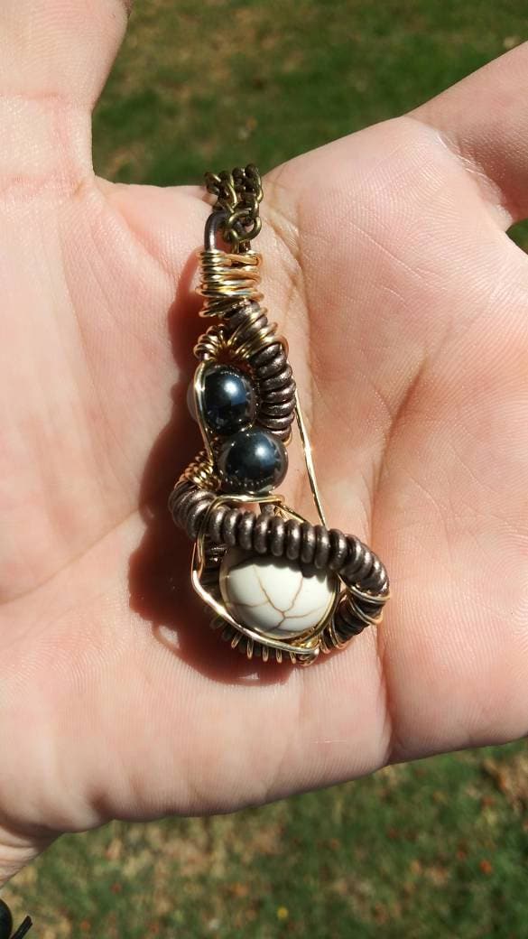 Darkness. Howlite and hematite necklace. Made by Eyesthatburnthemind.