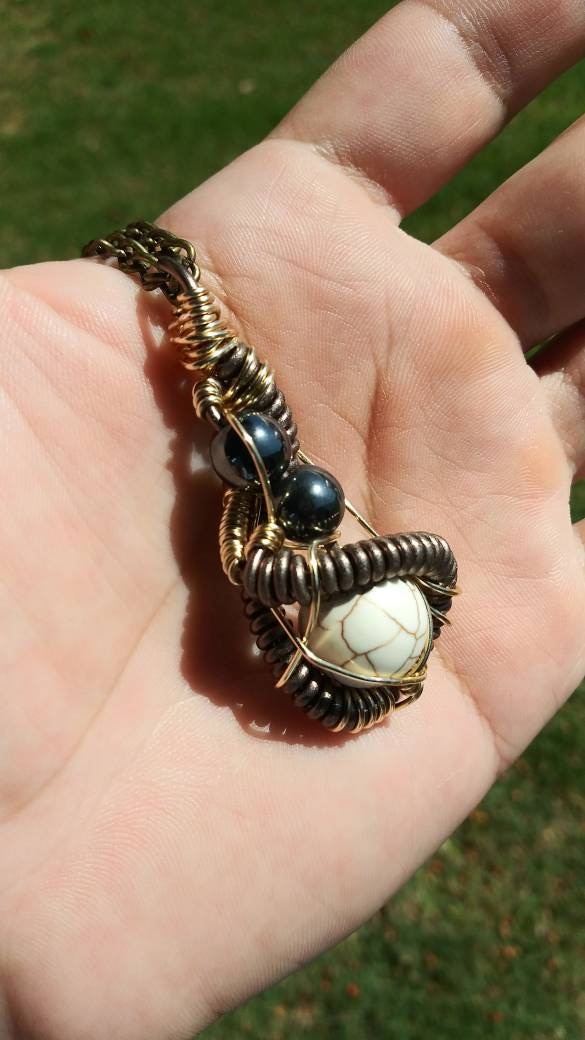 Darkness. Howlite and hematite necklace. Made by Eyesthatburnthemind.