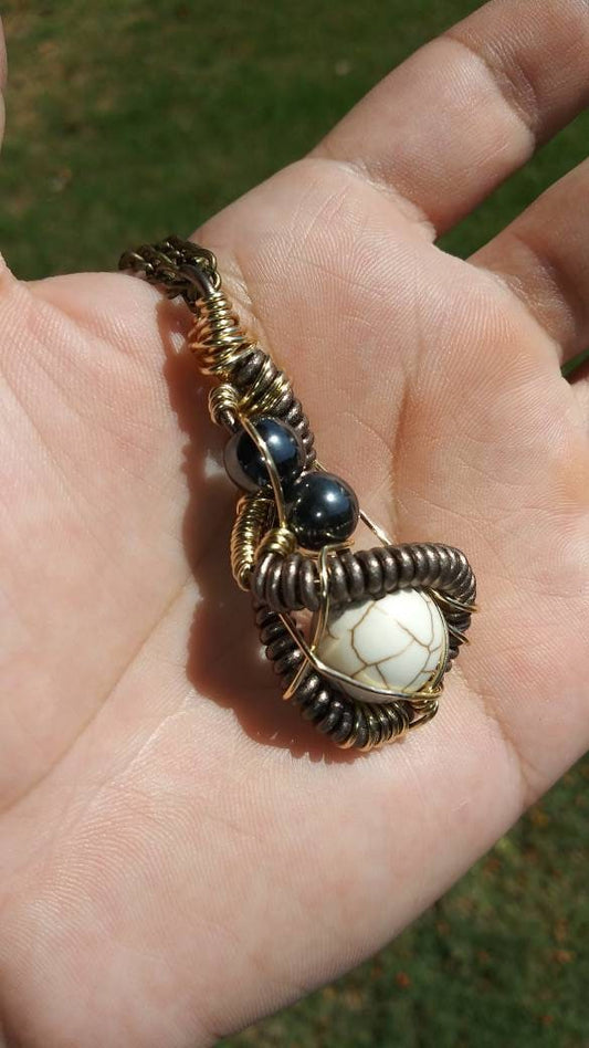 Darkness. Howlite and hematite necklace. Made by Eyesthatburnthemind.