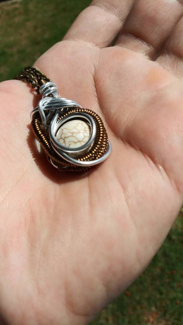 Far out landing. Howlite necklace. Made by Eyesthatburnthemind.