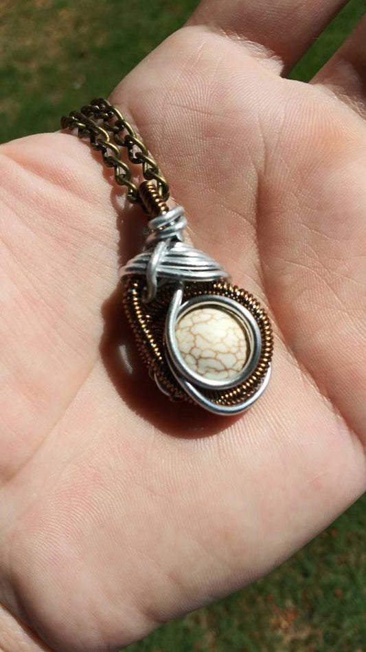 Far out landing. Howlite necklace. Made by Eyesthatburnthemind.
