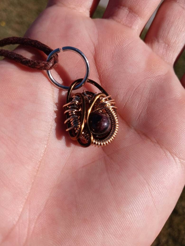 Ancient Contraption. Garnet crystal necklace. Made by Eyesthatburnthemind.