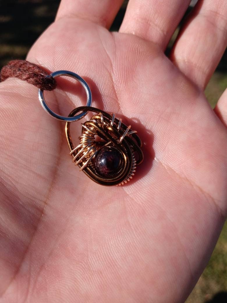 Ancient Contraption. Garnet crystal necklace. Made by Eyesthatburnthemind.