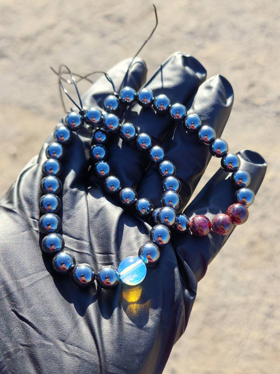 Mo·ral·i·ty. Pair of Hematite/ Opalite and Garnet bracelets. Your choice of size. Made by Eyesthatburnthemind.