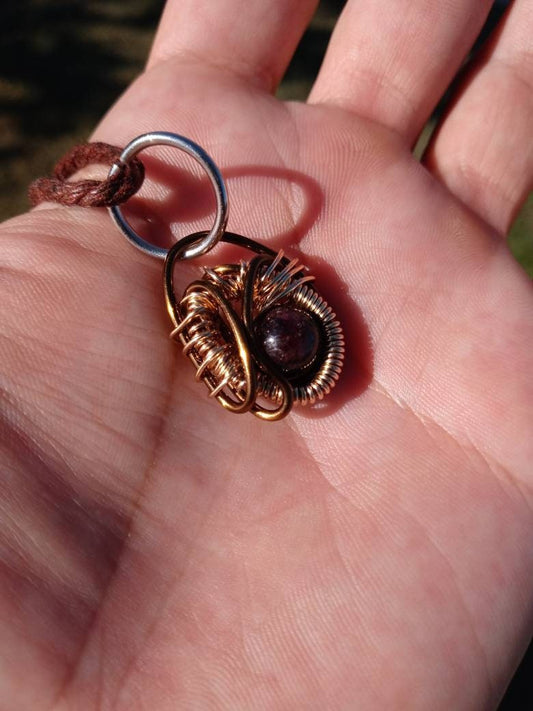 Ancient Contraption. Garnet crystal necklace. Made by Eyesthatburnthemind.