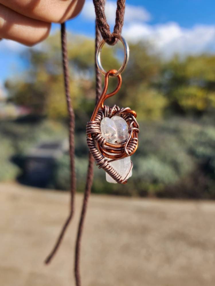 Unique Flow. Clear Quartz crystal necklace. Made by Eyesthatburnthemind.