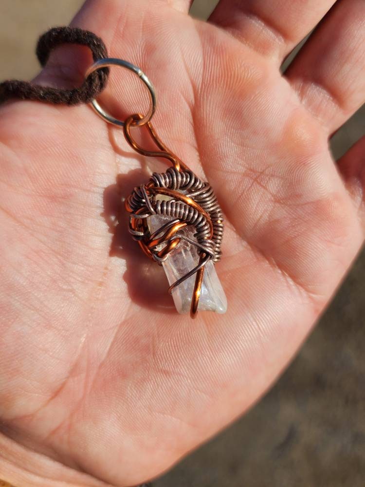 Unique Flow. Clear Quartz crystal necklace. Made by Eyesthatburnthemind.