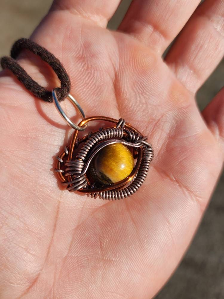 Primordial Vision. Golden Tigers Eye necklace. Made by Eyesthatburnthemind.