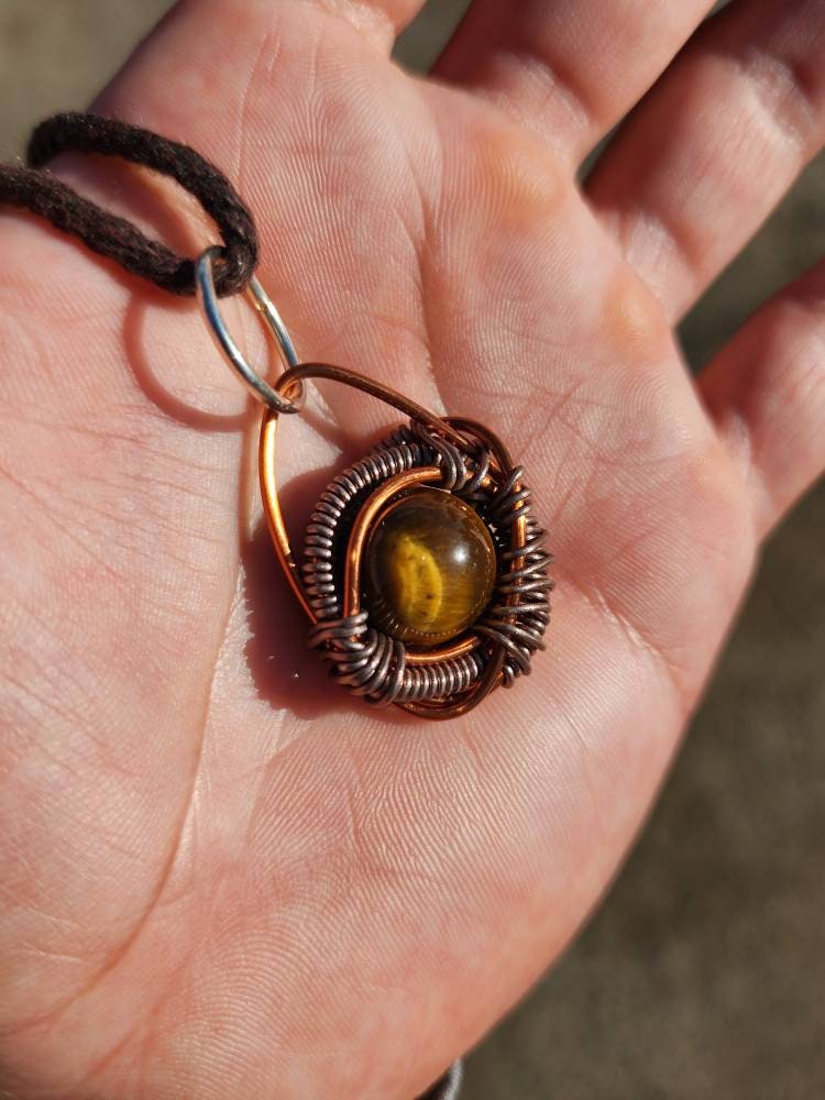 Primordial Vision. Golden Tigers Eye necklace. Made by Eyesthatburnthemind.