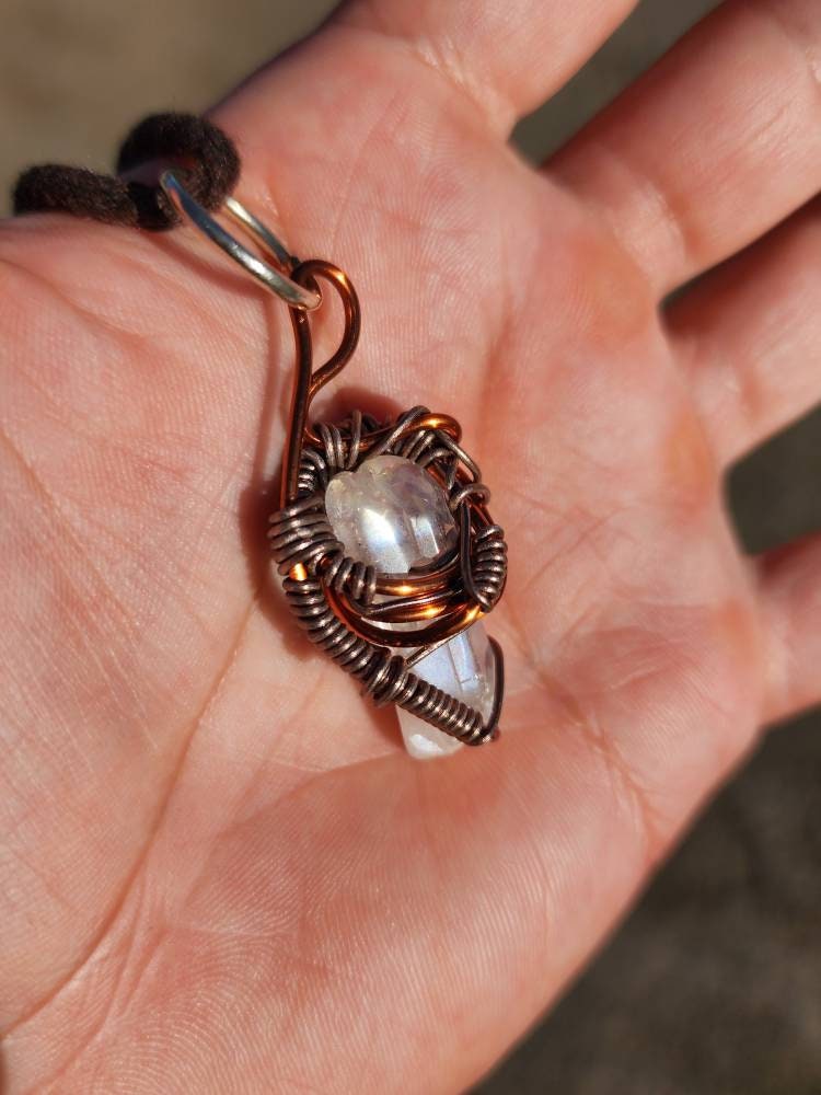 Unique Flow. Clear Quartz crystal necklace. Made by Eyesthatburnthemind.