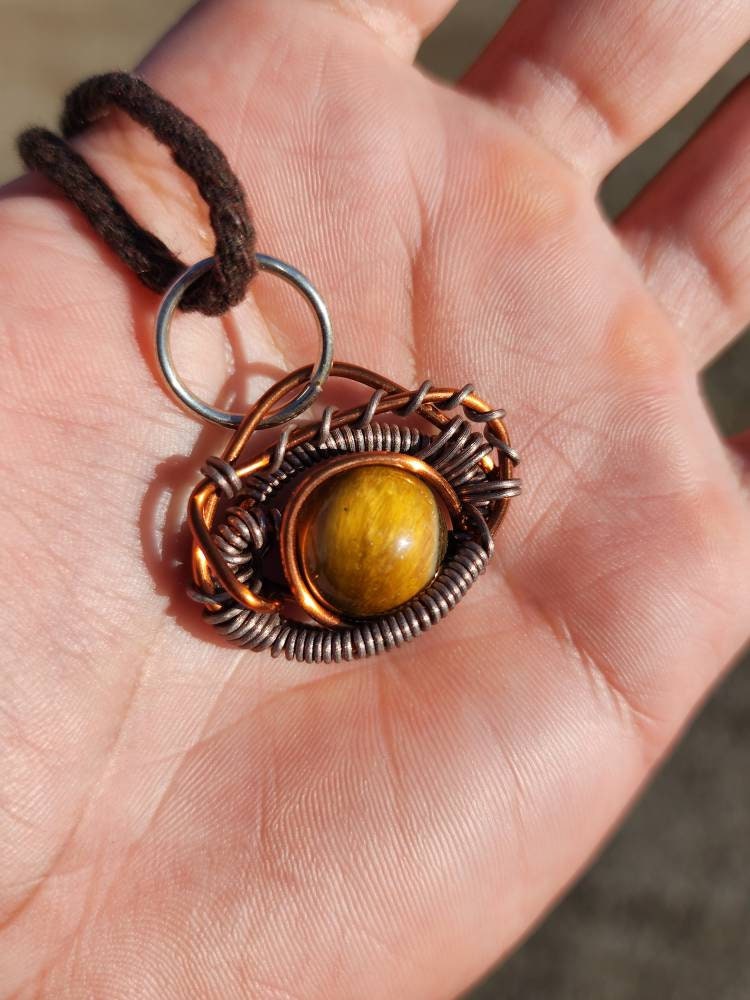 Primordial Vision. Golden Tigers Eye necklace. Made by Eyesthatburnthemind.