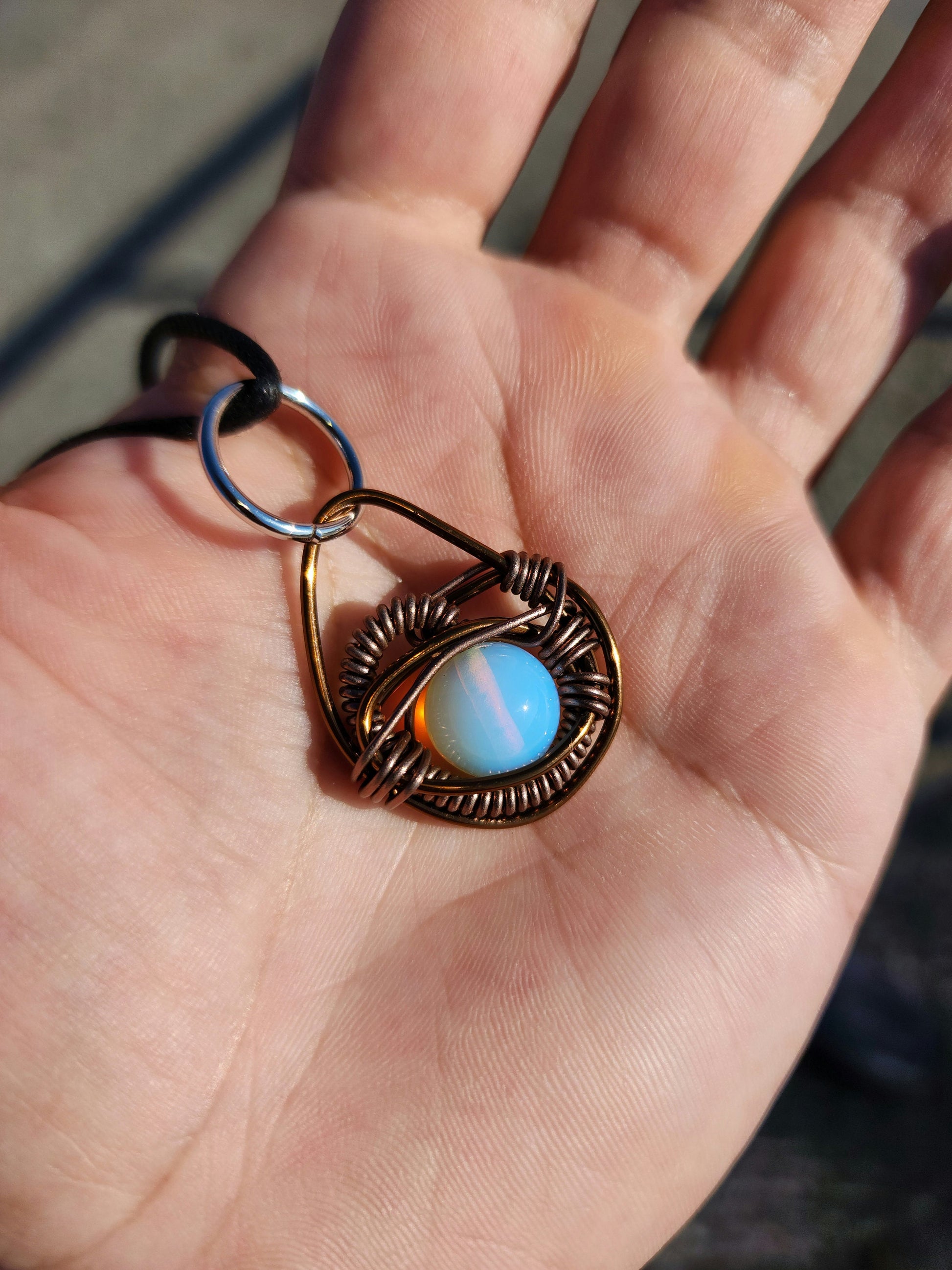 Eye of A Serpent. Opalite necklace. Made by Eyesthatburnthemind