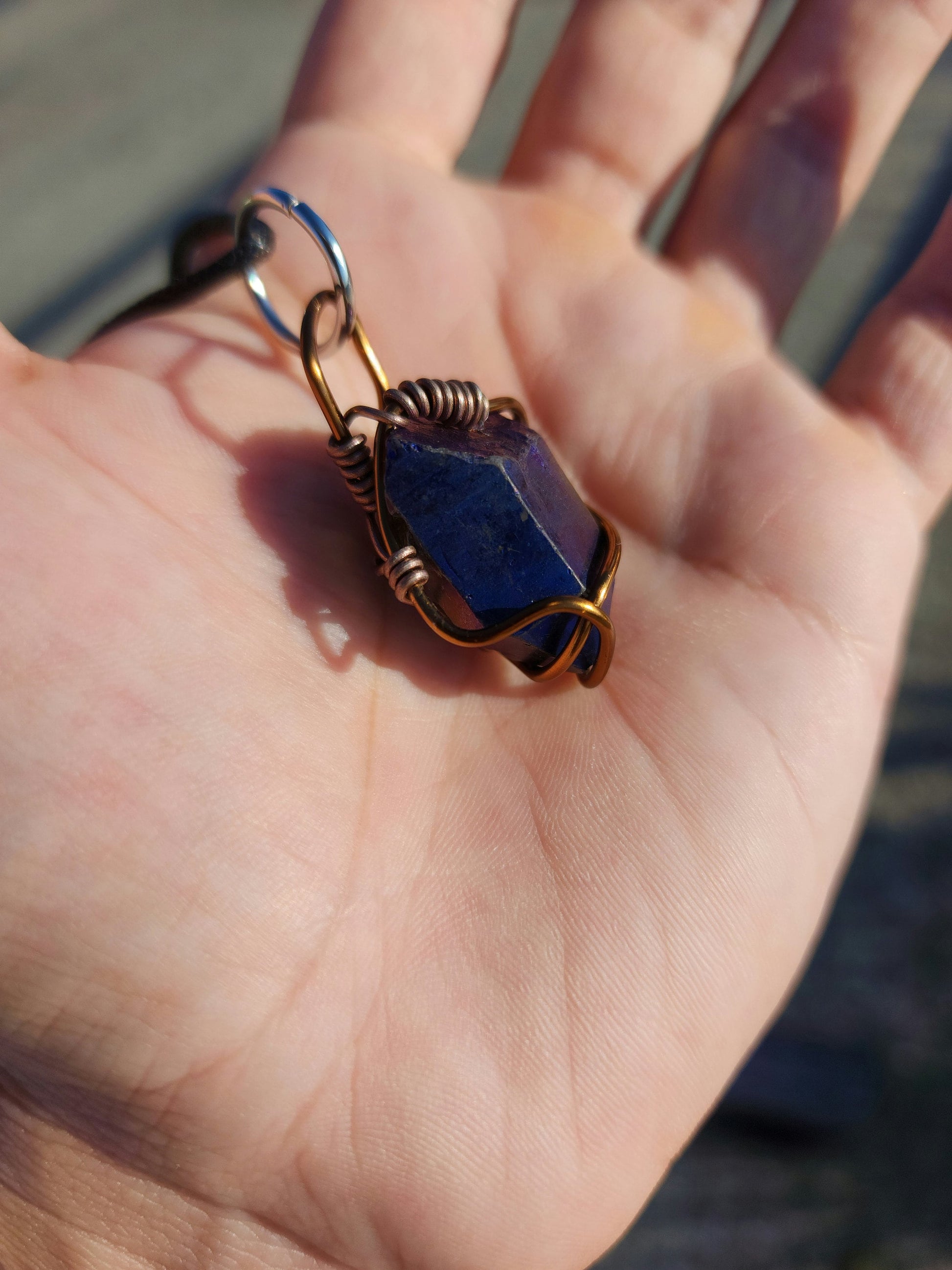 Radiant Chaos. Flashed quartz crystal necklace. Made by Eyesthatburnthemind.