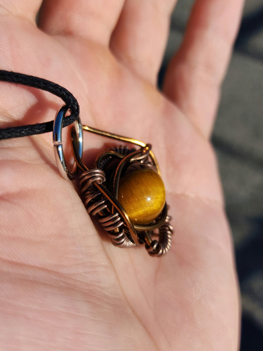 Primordial Vision. Golden Tigers Eye necklace. Made by Eyesthatburnthemind.