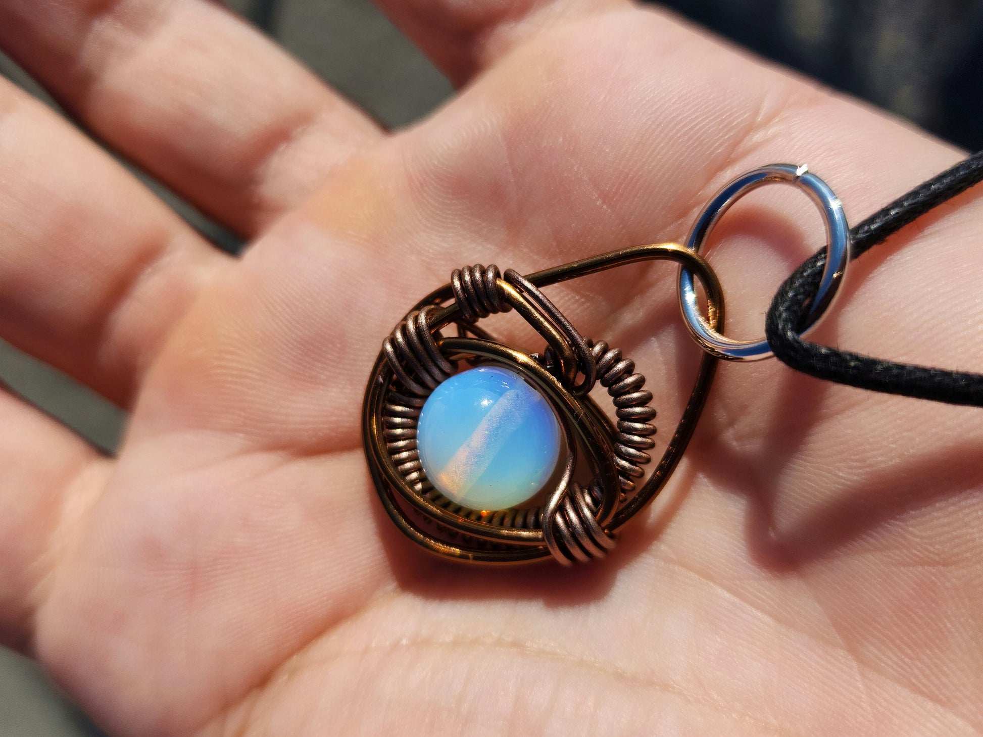 Eye of A Serpent. Opalite necklace. Made by Eyesthatburnthemind