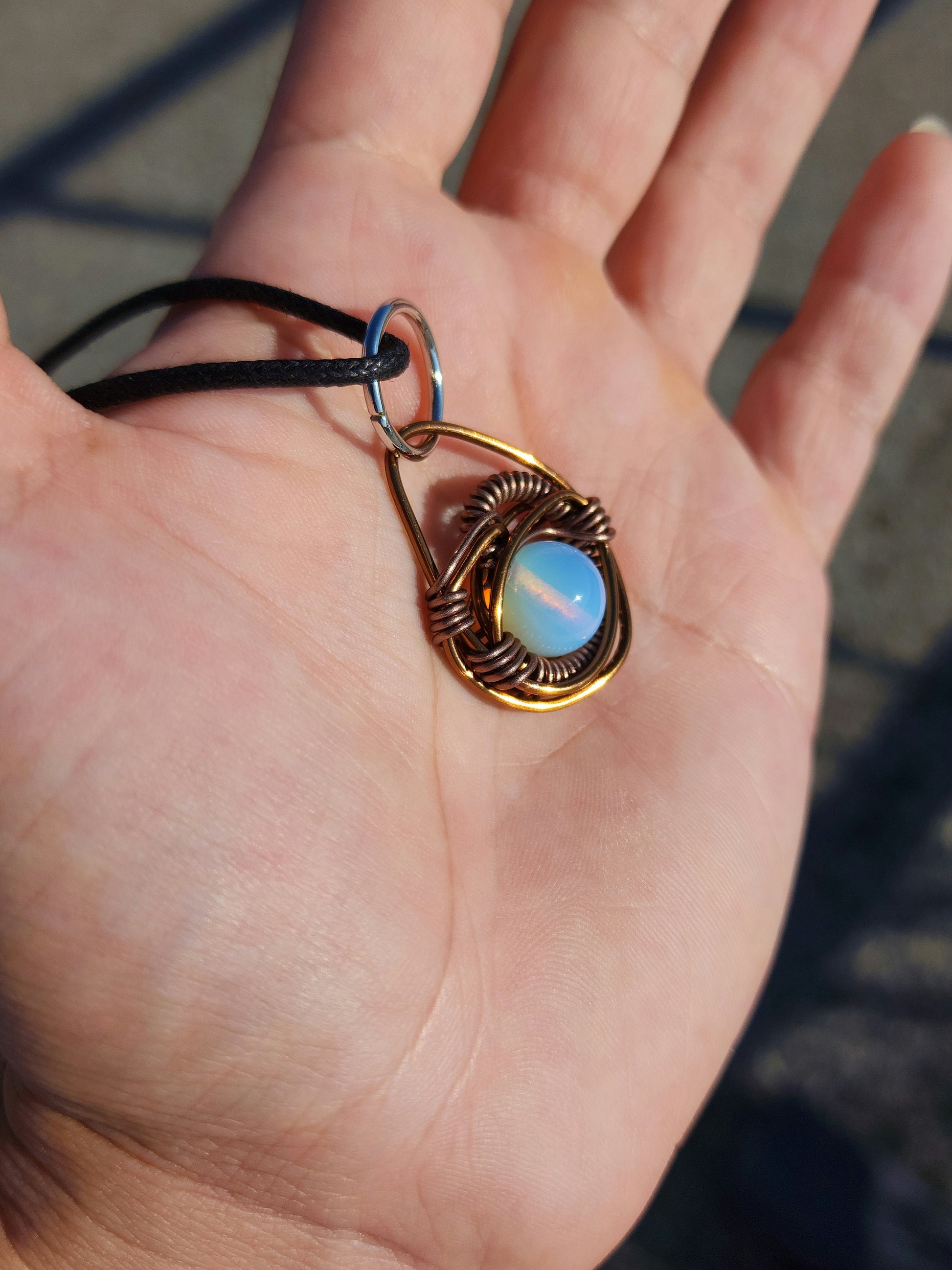 Eye of A Serpent. Opalite necklace. Made by Eyesthatburnthemind