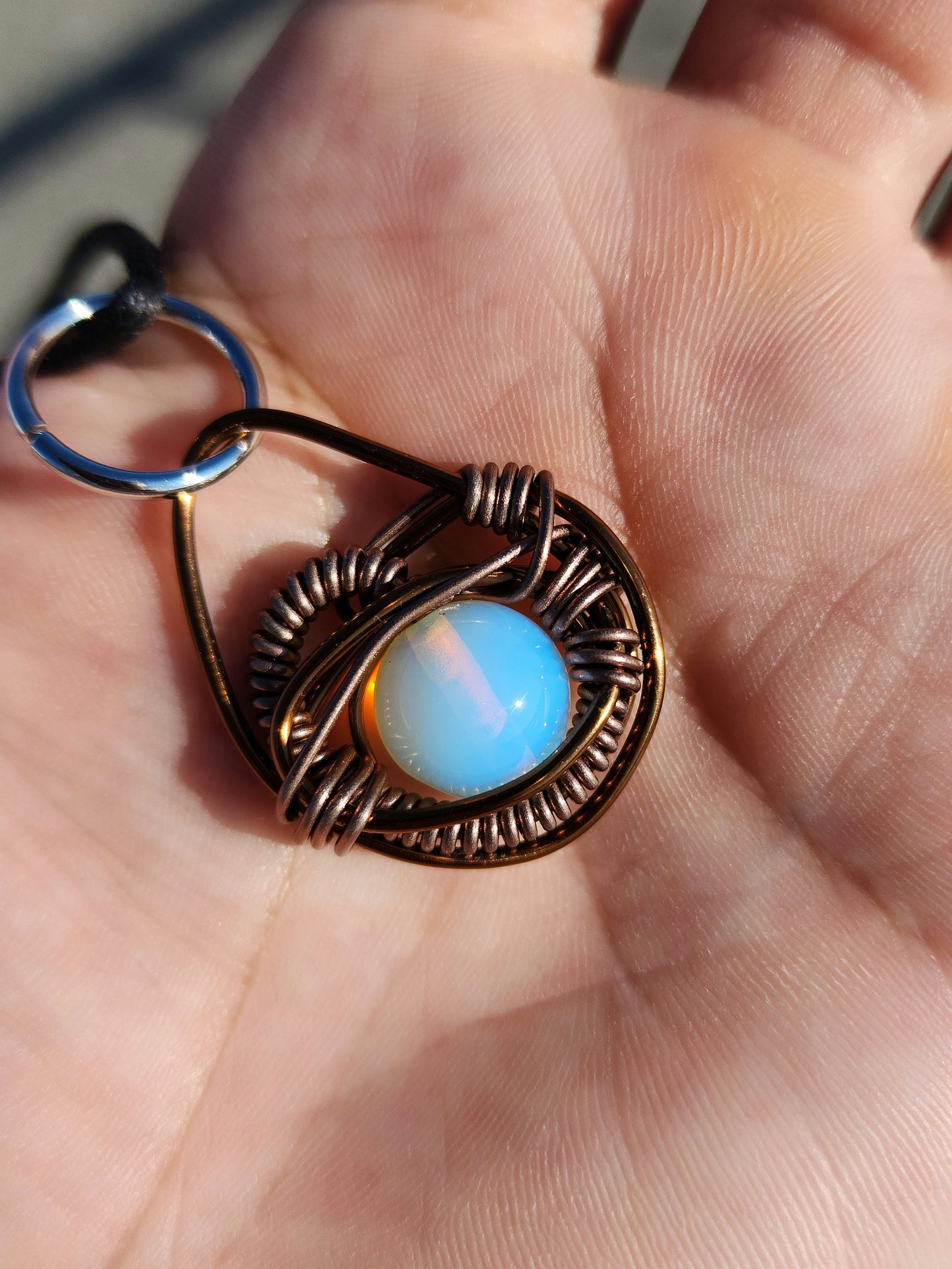 Eye of A Serpent. Opalite necklace. Made by Eyesthatburnthemind